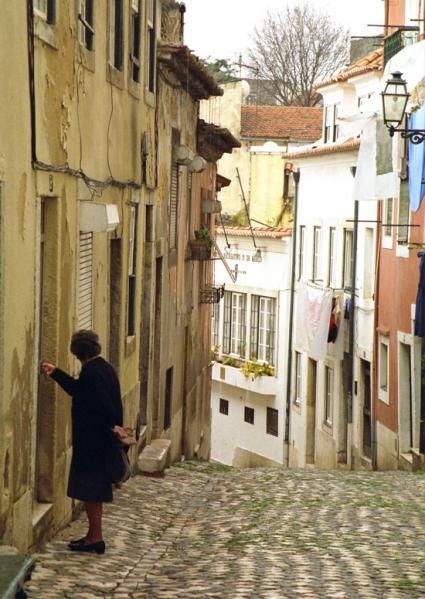 I'm trying to open the door while looking somewhere else. Alfama, Lisbon, Portugal